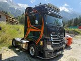 a truck that is parked on the side of the road