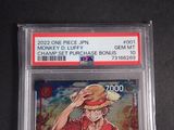 the card has a picture of a man in a straw hat holding a baseball bat