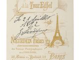 a close up of a ticket with a picture of the eiffel tower