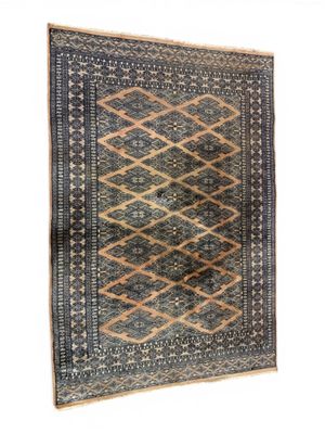 Tapis en laine noué main à décor géométrique sur fond saumon…