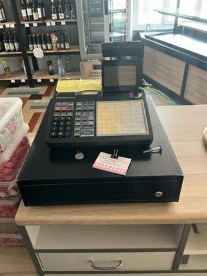 an image of a cash register in a store