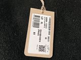 an image of a label on a black shirt
