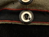 a close up of a hat with buttons on it