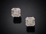 a pair of diamond earrings