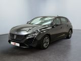 a black toyota corollant parked in a white room