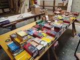 a lot of boxes on a table in a warehouse