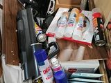 a drawer full of assorted items in a room