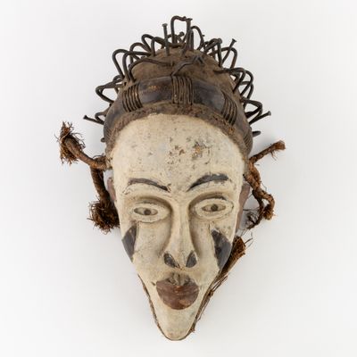an image of a mask on a white background with hair in the shape of a man ' s face