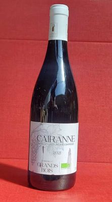 a bottle of wine that is sitting on a table