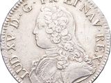 a close up of a coin on a white background