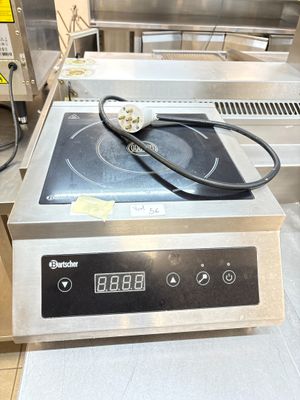 an image of a commercial stove top with a digital display