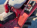 an image of a tractor with a seat on it ' s back