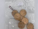 a bag of coins sitting on top of a table