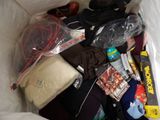 a bag full of clothes and other items in it
