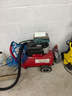 a picture of a red air compressor and a yellow vacuum