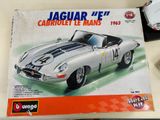 a box with a model of a car on the table