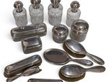 a lot of silver objects that are on the table
