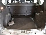 a trunk of a car with the back seats folded down