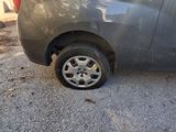 an image of a car that has been badly damaged