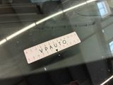 a sticker that says vautio on the windshield of a car
