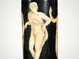 an old black and white vase with a picture of a nude woman on it