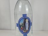 a bottle of water that is sitting on a table