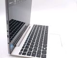 a close up of a laptop with a keyboard on it