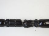 a black object that is sitting on a white table