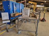 a large machine that is sitting in a warehouse
