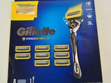 packaging of gillette proshield razors on a white surface