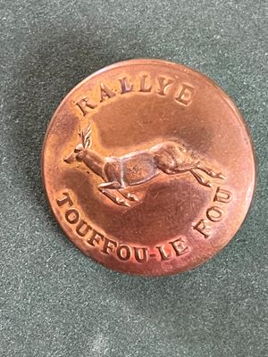 une pièce de cuivre sur laquelle est représenté un cheval