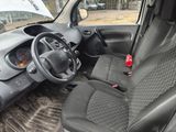 the interior of a car with a steering wheel and a dashboard