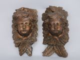 pair of antique bronze wall sculptures of two children ' s heads