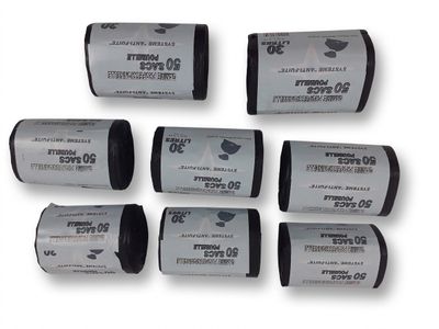 six rouleaux de pellicule noir et blanc empilés les uns sur les autres