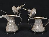 pair of antique silver plated jugs with handles