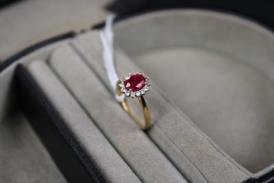 a ring that is sitting in a box on a table
