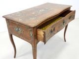 a small wooden table with a drawer underneath it