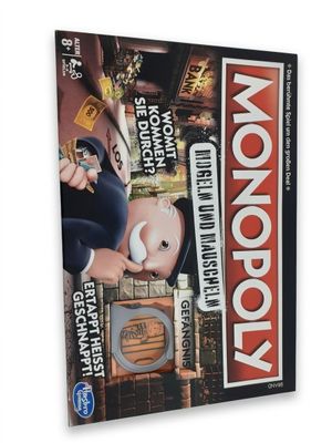 jeu de société Monopoly avec un personnage de Monopoly sur la couverture