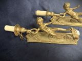 pair of antique brass candlesticks with cherensils and cherensils