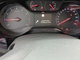 a close up of a car dashboard with a speedometer and gauges