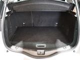 a trunk of a car with the back door open