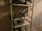 a shelf with many items on it in a room