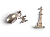 a silver object with a lightning bolt on it and a silver object with a lightning bolt on it
