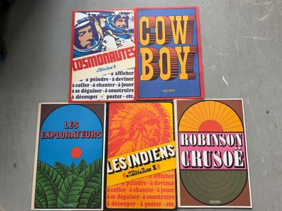 several posters of various types of music are displayed on a table