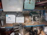 a shelf with many items on it in a room