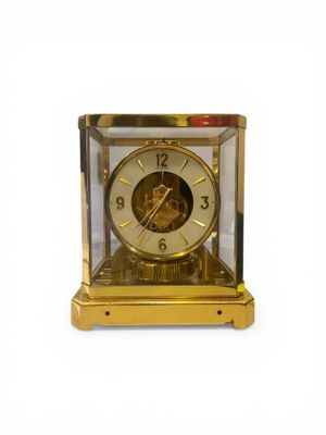 LECOULTRE ATMOS Horloge en métal doré et verre minéral repos…