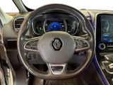 the interior of a car with a steering wheel and dashboard controls