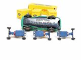 a toy train that is sitting next to other toy trains