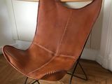leather butterfly chair with black metal frame