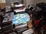 a pile of luggage sitting on the floor in a room